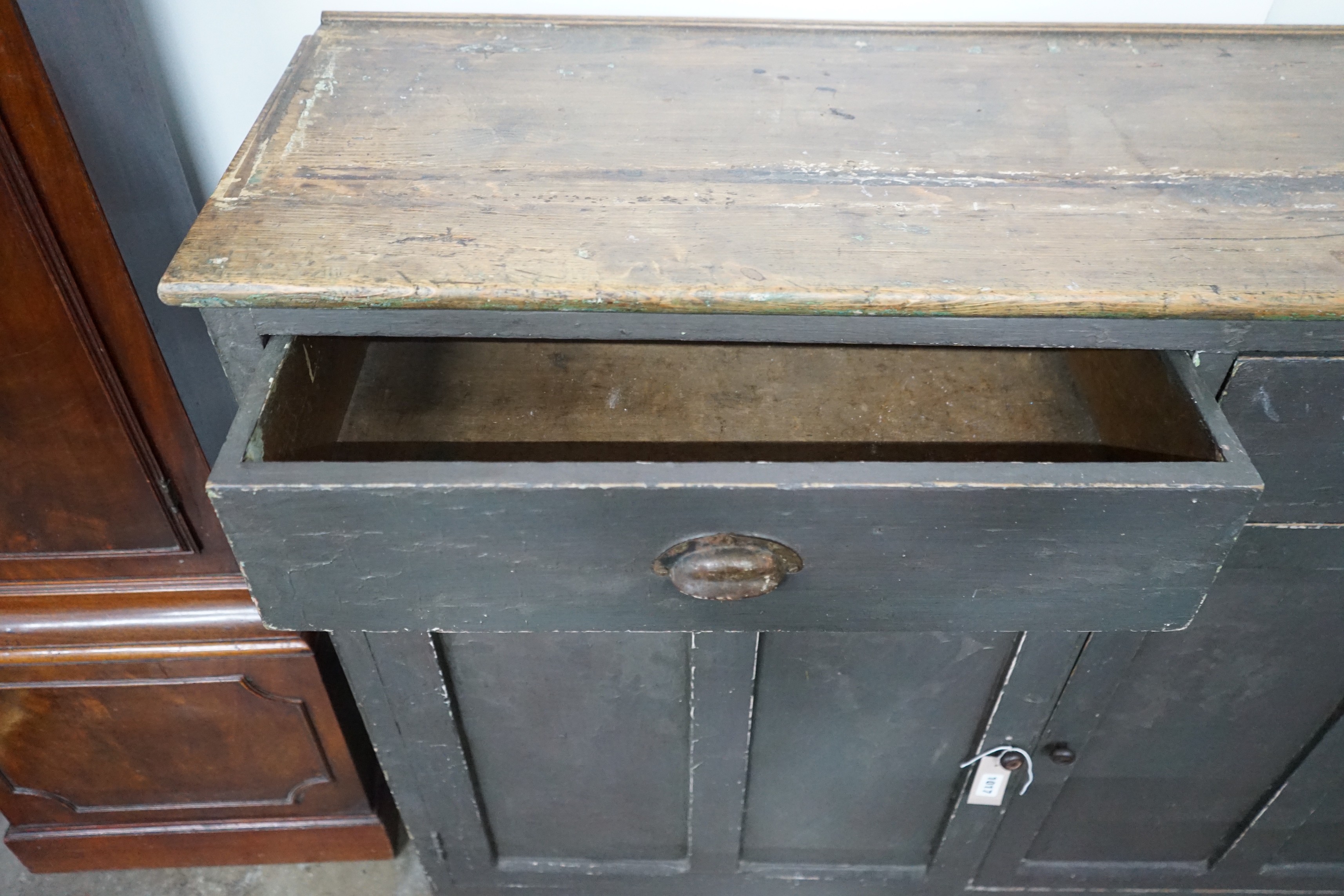 A Victorian painted pine side cabinet, width 140cm, depth 40cm, height 103cm